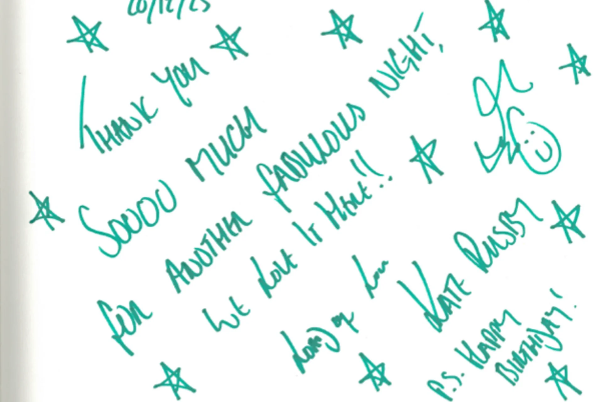 Image shows a white handwritten thank you note in green ink. The message is signed by Kate Rusby and dated 20 Dec 25. The note includes hand drawn stars and a smiley face.