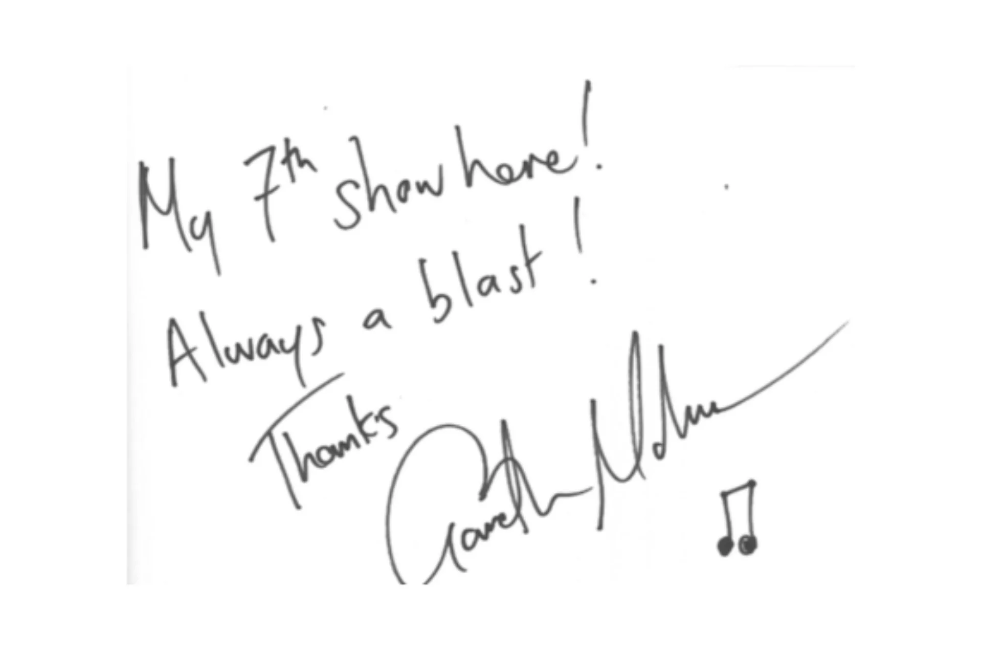 Image shows a white paper note, handwritten in black ink is a message that reads 'My 7th show here! Always a blast. Love from Gareth Malone'